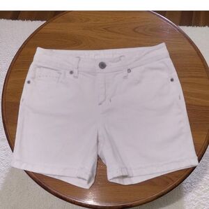 Hydraulic White denim mid rise shorts with silver embroidered pockets